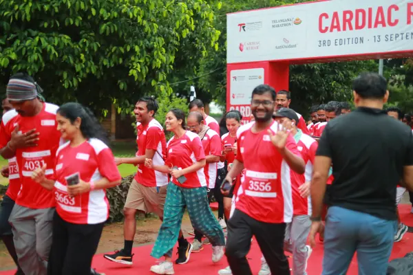 Smiles and waves as the crowd walks out