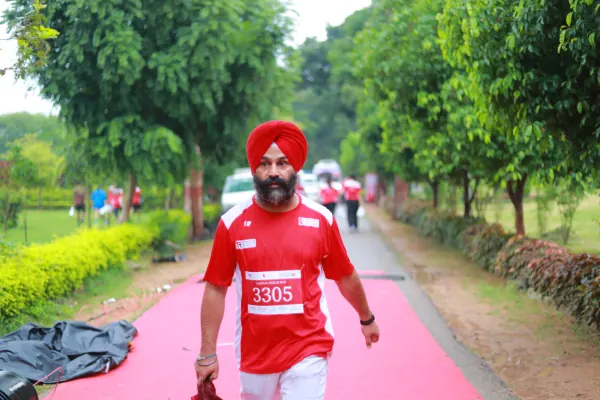 Sikh runner walking in proudly