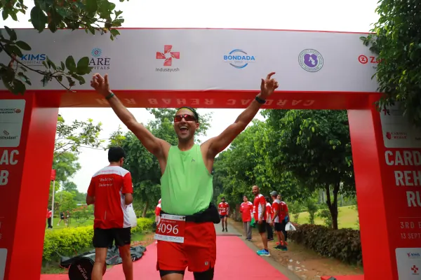 Arms-up finisher under the arch