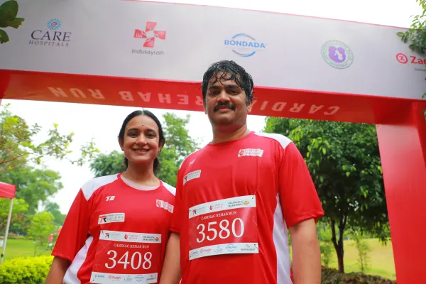 Father and daughter at the finish arch