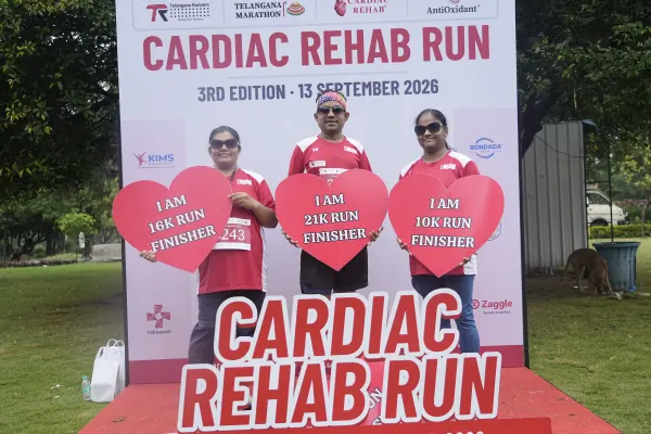 Three finishers with heart cut-outs