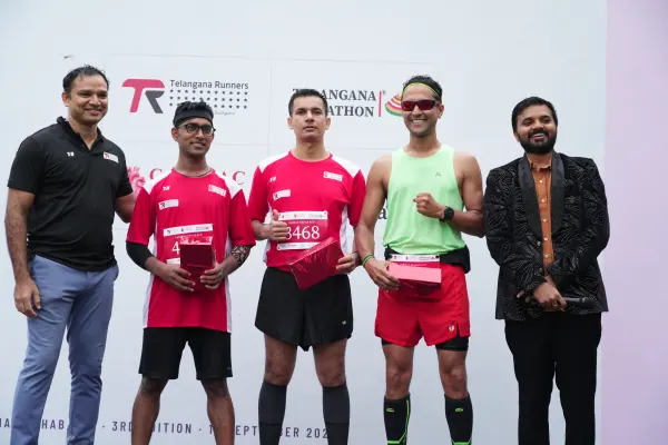 Winners lined up with guests