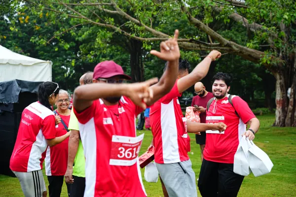 Runners dancing with prize bags